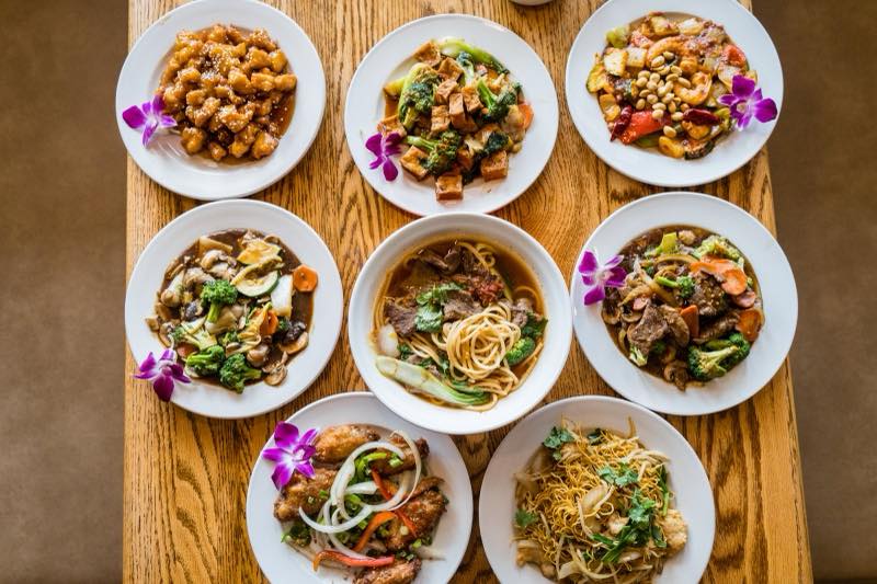 Family-style spread of dishes at Autumn Court, Phoenix