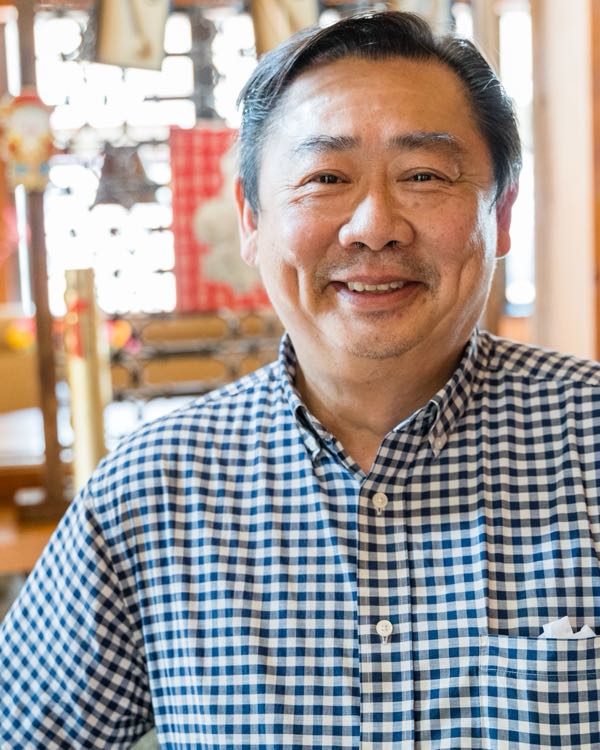 Raymond Tang seated in the Autumn Court dining room, Phoenix
